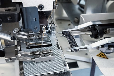 防止褲攀折邊側(cè)露裝置